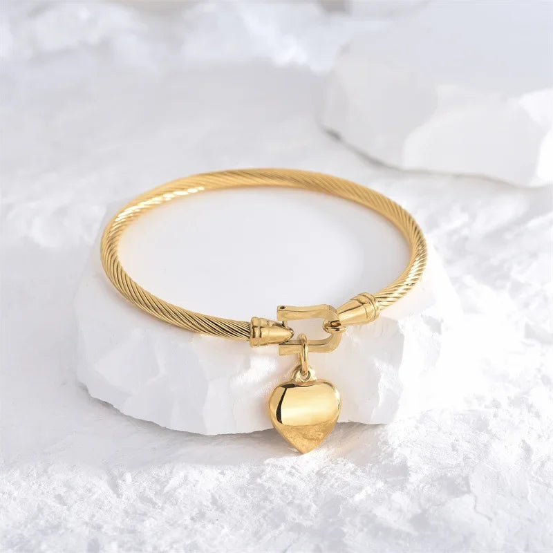 Battement d’Or - Bracelet Cœur Suspendu