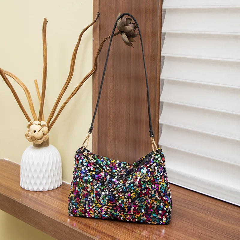 Comète Prismatique — Le Sac aux Éclats Dansants