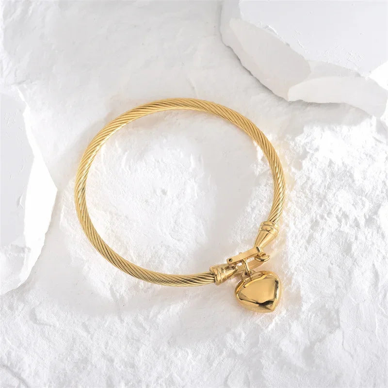 Battement d’Or - Bracelet Cœur Suspendu