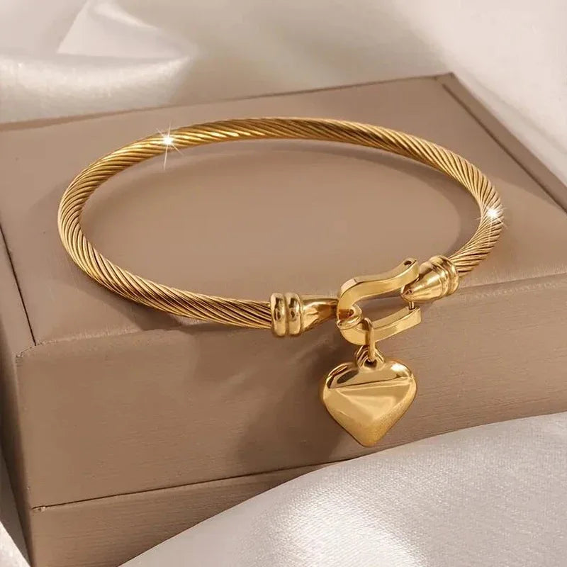 Battement d’Or - Bracelet Cœur Suspendu